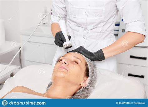 Cosmetologist Makes Ultrasound Skin Tightening For Rejuvenation Woman