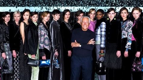 Giorgio Armani Poses In Front Of Models At His Giorgio Armani Fall 2020