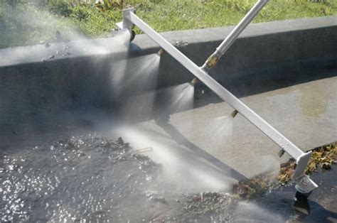 This Power Washing Broom Is A Genius Way To Clean Your Patio Or Garage