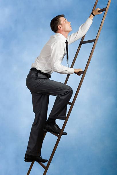Best Man Climbing Ladder Stock Photos Pictures And Royalty Free Images