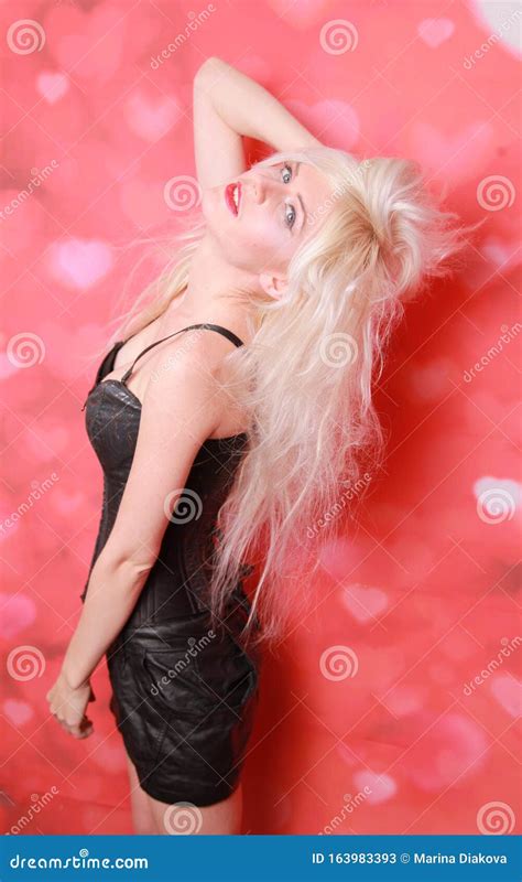 Pretty Blonde Girl Having Fun And Ready To Go To A Party Stock Image