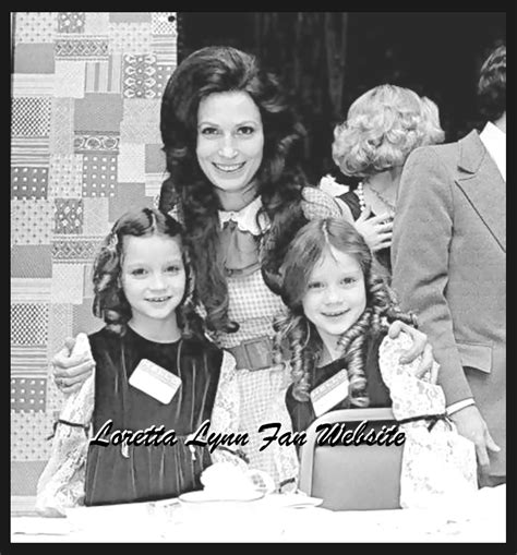 Loretta With Her Twin Daughters When She Won A Woman Of The Year Award