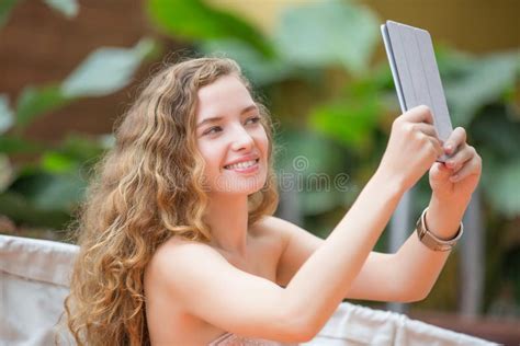 Beautiful Lady Using Tablet And Doing A Selfie Stock Photo Image Of