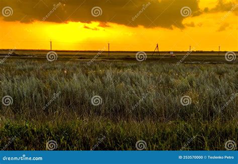 A Sunset Under The Ukrainian Steppe Near The Sea Of Azov Stock Photo