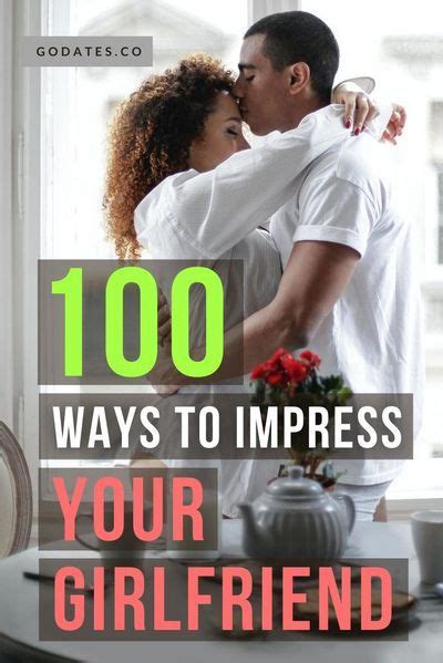 A Man And Woman Kissing In Front Of A Window With The Words 100 Ways To Impress Your Girlfriend