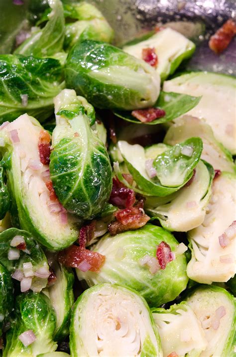 Clean and trim brussels sprouts and cut them in half. Roasted Brussels Sprouts with Bacon | I'd Rather Be A Chef