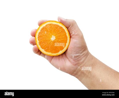 Hand Holding Slice Of Orange Isolated On White Background Stock Photo