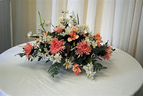 The flowers are hot glued into the styrofoam the styrofoam is hot glued and wired to the. Spring Silk Saddle for a Grave Stone | Funeral flower ...