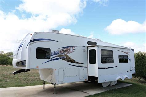 Maybe you would like to learn more about one of these? 2011 Used Forest River WILDCAT 323QB-32QBT Fifth Wheel in ...