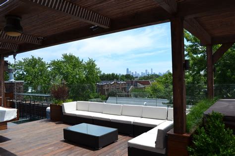 This project included building a penthouse on top of a building in we added a roof deck of ipe tiles, a cable railing, an elevator from the basement and the beautiful. Urban Rooftop in Lakeview - Contemporary - Deck - Chicago ...