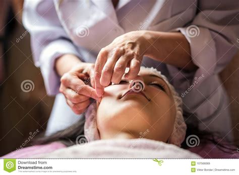 Calm Girl Having Spa Facial Massage In Luxurious Beauty Salon Stock Image Image Of Hand