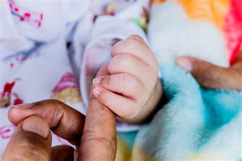Close Up Of Newborn Child Touching Mother Hand Stock Photo Image Of