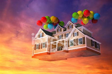 House Flying In The Sky With Balloons Stock Photo Royalty Free