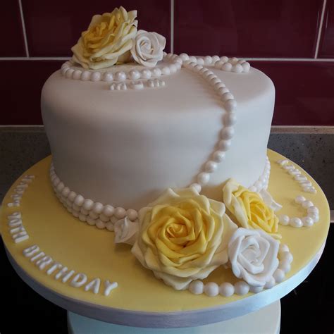 He would have been happier in your presence but the lovely designer cake would work wonders. Yellow and white rose with pearls birthday cake | 90th ...