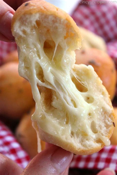 Moreover, the biscuit bombs filled with gooey mozzarella brushed with the garlic ranch butter and baked into perfection give a delicious taste. Garlic Cheese Bombs - CincyShopper