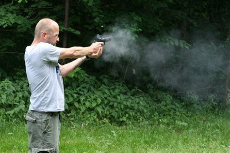 man shooting a gun Free Stock Photo | FreeImages
