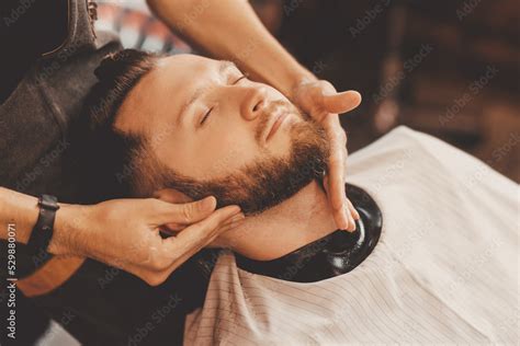 Hairdresser Massages Man Face To Improve Hair Growth And Skin Care Preparing And Softening