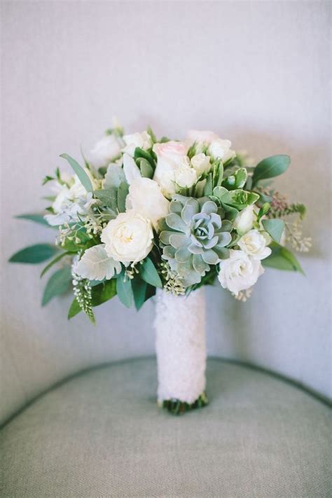 Calla lilies have a chic modern edge, roses give off an air of classic romance and peonies lend that lush, whimsical feeling to any arrangement. white and green succulents wedding bouquet - EmmaLovesWeddings