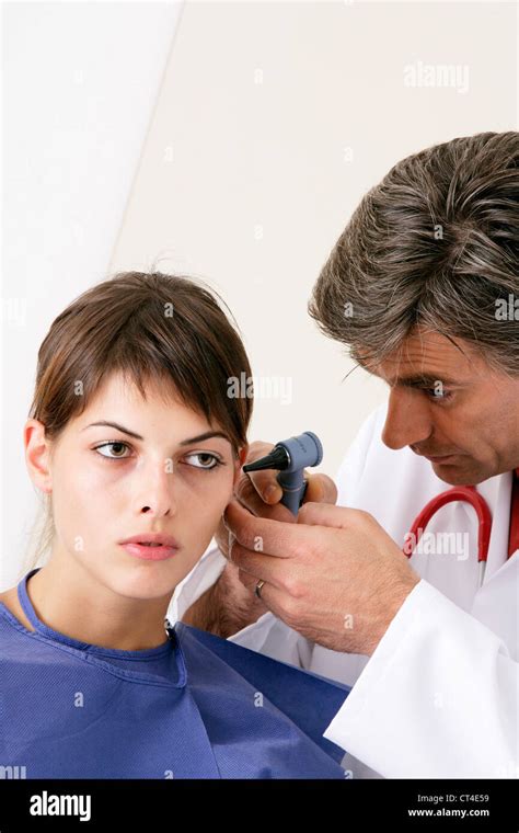 Nose And Throat Examination Otoscope Health Professional Hi Res Stock