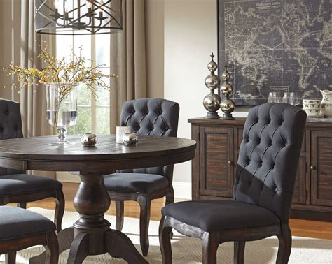 Trudell Dark Brown Round Extendable Pedestal Dining Table From Ashley