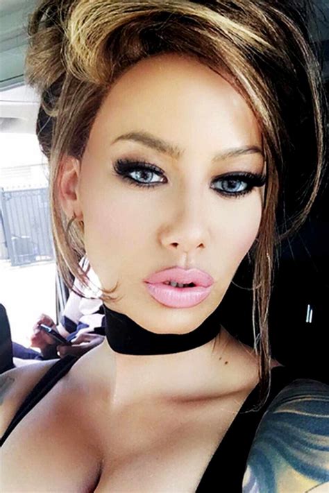 Amber Rose Wears Beehive Wig Looks Unrecognizable