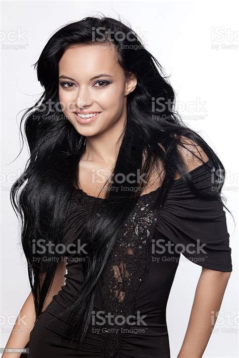 Young Woman With Black Hair Stock Photo Download Image Now 18 19