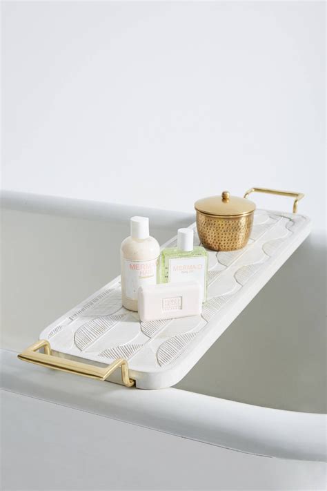 You can enhance your bath time experience with a bathtub tray. Lotus Bathtub Caddy in 2020 | Bathtub caddy, Bathtub ...