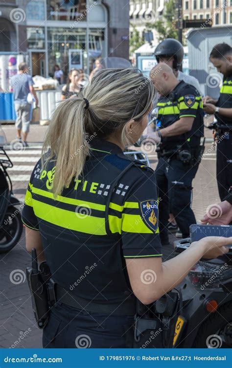 police woman with a p99 gun at amsterdam the netherlands 2019 editorial photo image of female