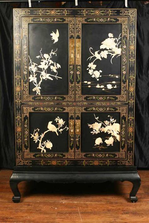 This beautiful chinese lacquer, coromandel wood carved cabinet is decorated in polychrome and gilt with figures, pagodas and landscape. French Chinese Lacquer Cabinet Chest Cupboard Japanning Laquer