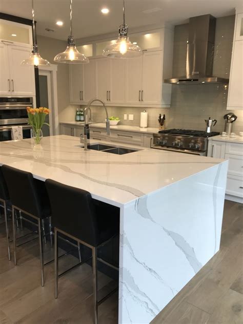 Elegant, easy to maintain, and durable, cambria countertops and surfaces offer a superior alternative to marble countertops. Cambria Brittanica Quartz Waterfall Island by Bella Marble ...