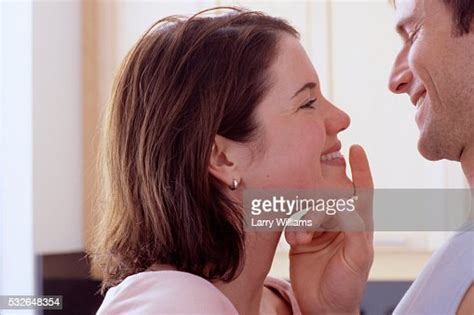 Man Touching Womans Chin High Res Stock Photo Getty Images