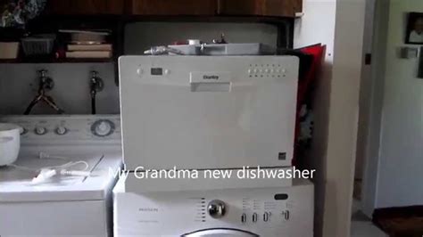 Drill holes into the dishwasher side of the sink cabinet, if needed. how I install a countertop dishwasher - YouTube