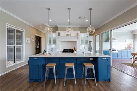 Kitchens By Kathie Combine Deep Blue Cabinetry With Caesarstone® Alpine