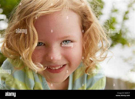 Low Angle Close Up Portrait Of Cute Girl Stock Photo Alamy