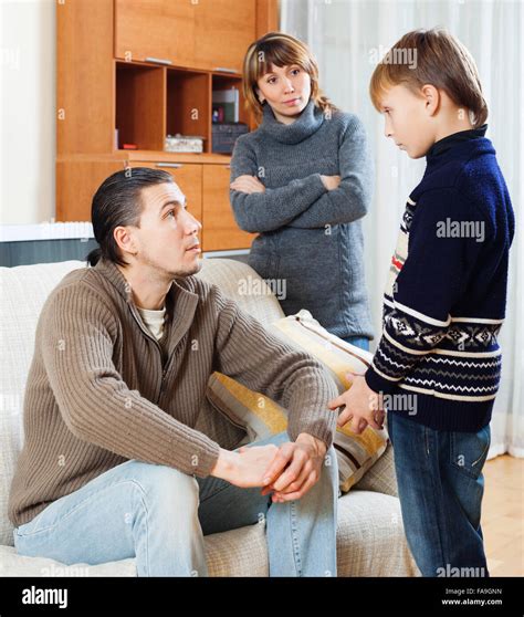 Mother And Father Together Scolding Teenager Son Stock Photo Alamy