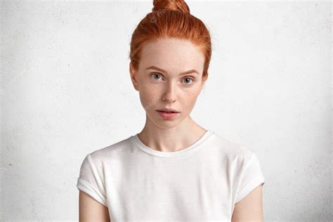 Free Photo Attractive Young Red Haired Female With Freckled Skin And