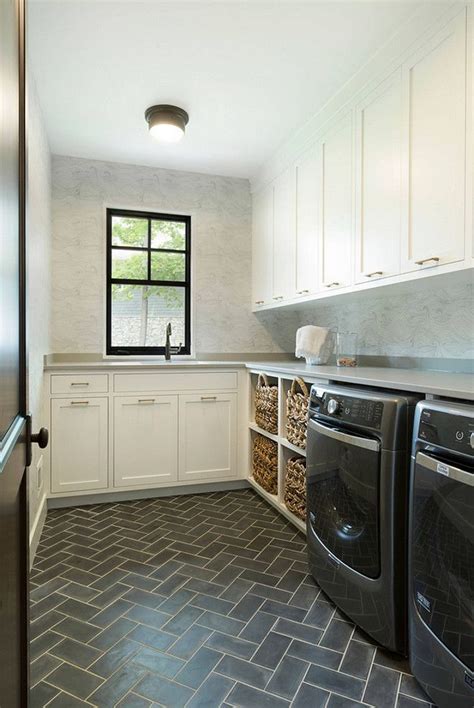 Though laundry and mud rooms by their nature are pretty much utilitarian, there's still no reason you can't prioritize looks. Custom handmade cement floor tiles laid in a herringbone pattern. Laundry room… | Laundry Rooms ...