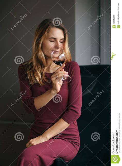Attractive Woman Drink Red Wine In The Restaurant Stock Photo Image