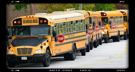 School Buses Lined Up At Davis Elementary School Outside Of Chicago In