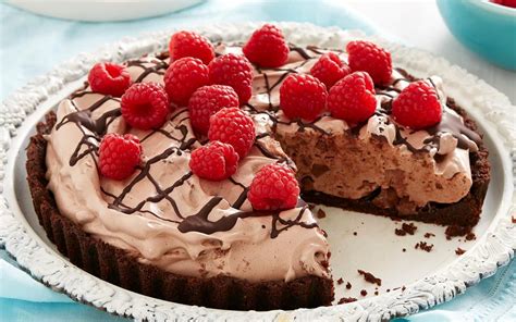 This gorgeous cake takes some time to prepare, but it is very easy. With fluffy chocolate marshmallow, dark choc chunks and a ...