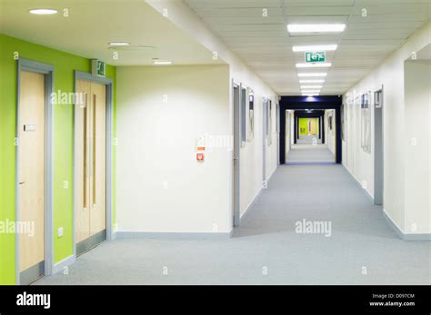 View Along A Bright Corridor In A Modern Secondary School Stock Photo