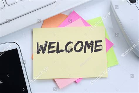welcome new employee colleague refugees refugee immigrants desk computer keyboard business
