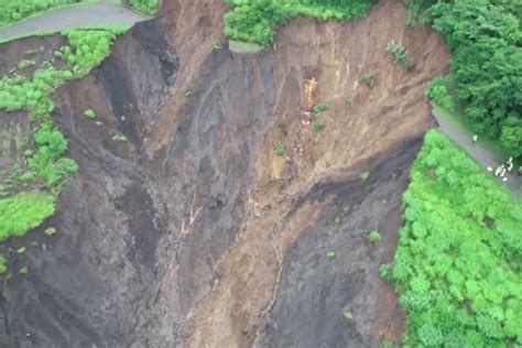Heavy Rain Causes Massive Landslide In Japanese Seaside Town Ground