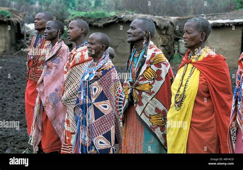 Africa Kenya Masai Mara National Reserve Masai Women Singing Dressed In