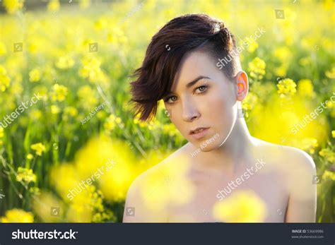 Young Modern Girl With No Clothes On Nature Stock Photo