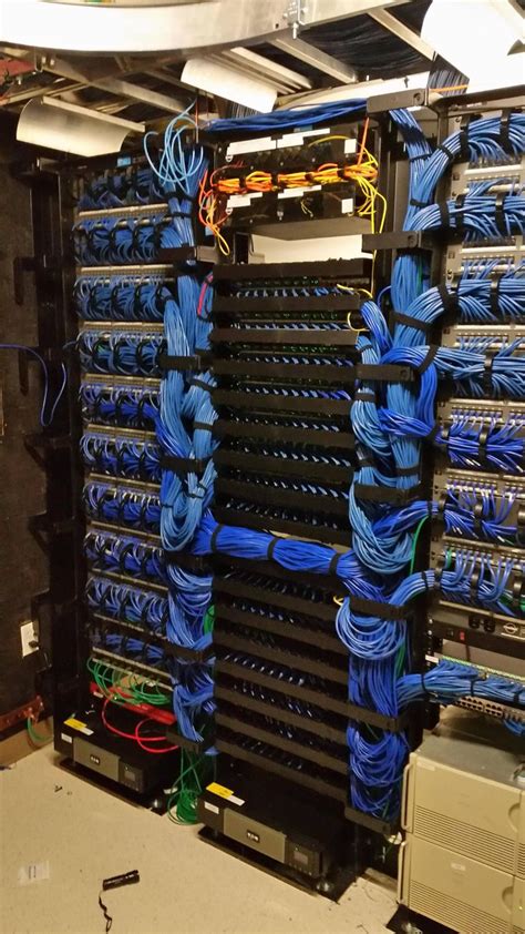 The Inside Of A Server Room With Many Wires