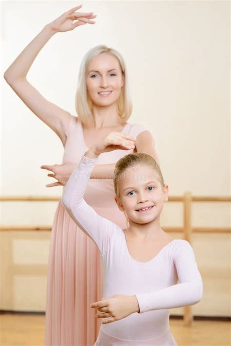 Ballet Teacher And Her Apprentice Are Holding A Stock Image Image Of