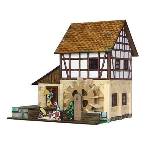 Bajo el baño y el dormitorio principal discurría el canal de agua que movía las piedras del molino. Maqueta en kit Casa con Molino de Agua de 172 piezas