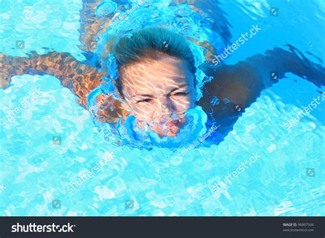 Girl Swimming Underwater In A Swimming Pool Stock Photo 96907504