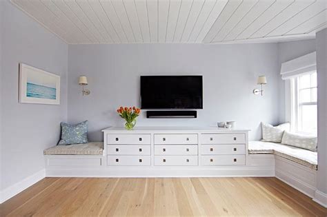 Maybe you would like to learn more about one of these? Beach Bungalow Bedroom with TV Over Built In Dresser ...